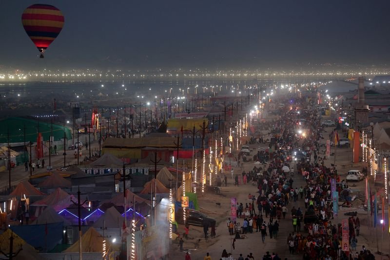 Hindus taking a holy dip during Kumbh Mela festival in Prayagraj, India - Global Banking & Finance Review