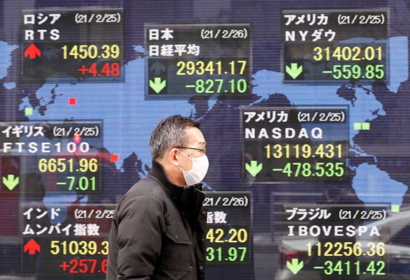 Image for Asian shares hit two-week lows, dollar gains as investors scurry for cover