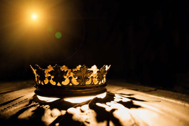 Royal crown illuminated, symbolizing public sentiment towards UK Royals - Global Banking & Finance Review
