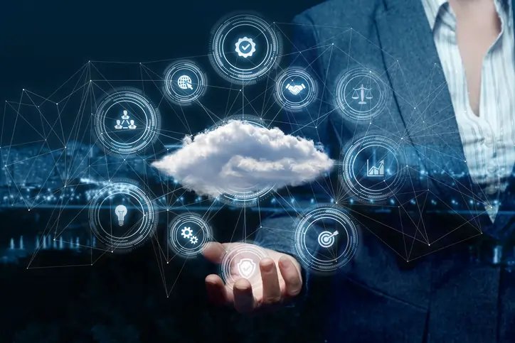 Business professionals discussing cloud migration and workload automation - Global Banking & Finance Review