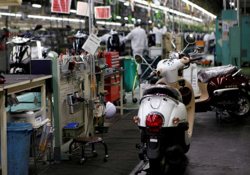 Image for Japan manufacturers’ mood hits two-year high on chip demand: Reuters Tankan