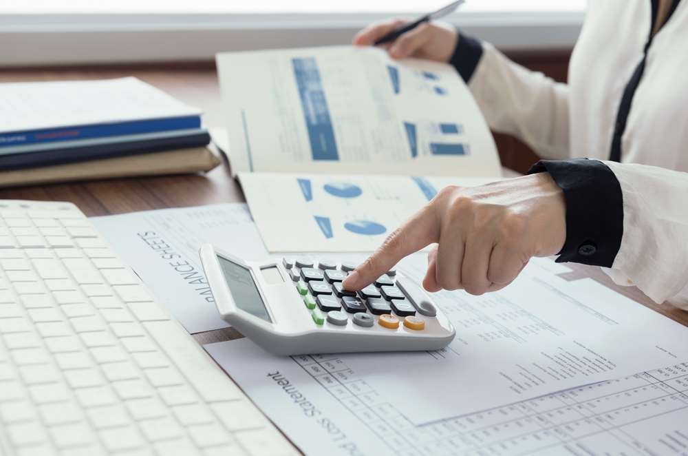 Diverse group of investment professionals discussing inclusion and diversity - Global Banking & Finance Review