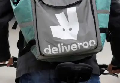 Image for Deliveroo slashes revenue outlook as UK consumers cut spending