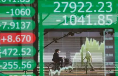 Image for Asian shares kick-off week on cautious note as COVID-19 cases spike