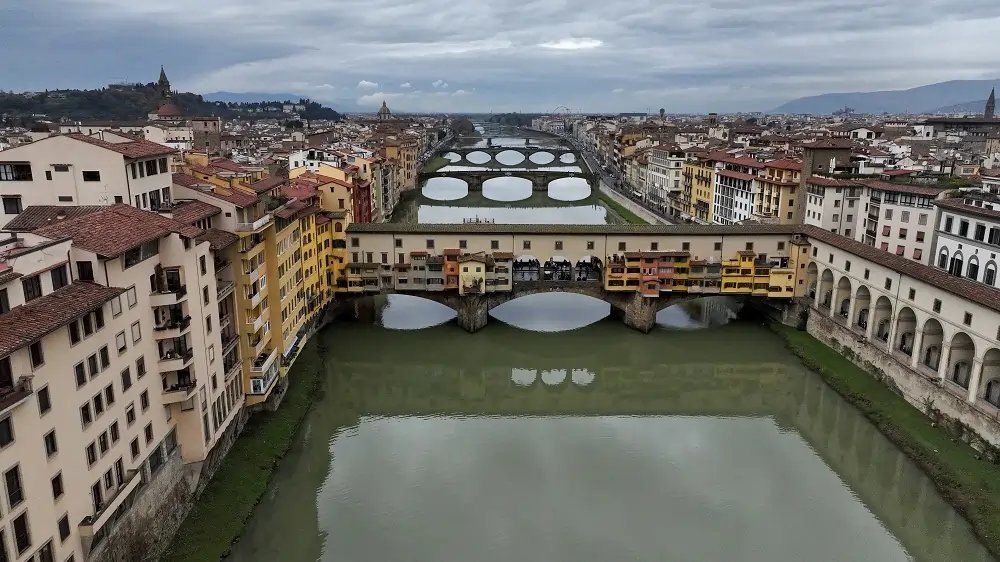 View of the Vasari Corridor over Ponte Vecchio, a landmark in Florence - Global Banking & Finance Review