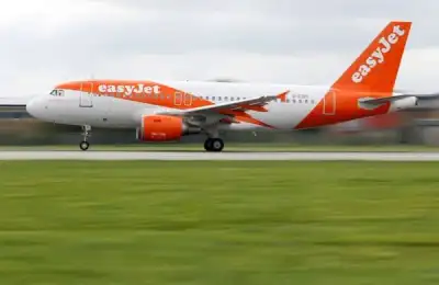 Image for EasyJet cuts more flights to try to manage disruption