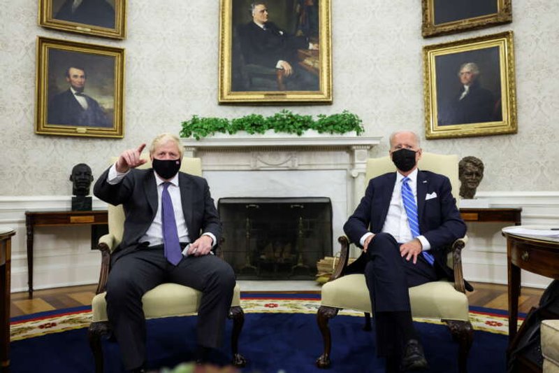 Image for Biden, UK’s Johnson talk trade and trains in White House meeting