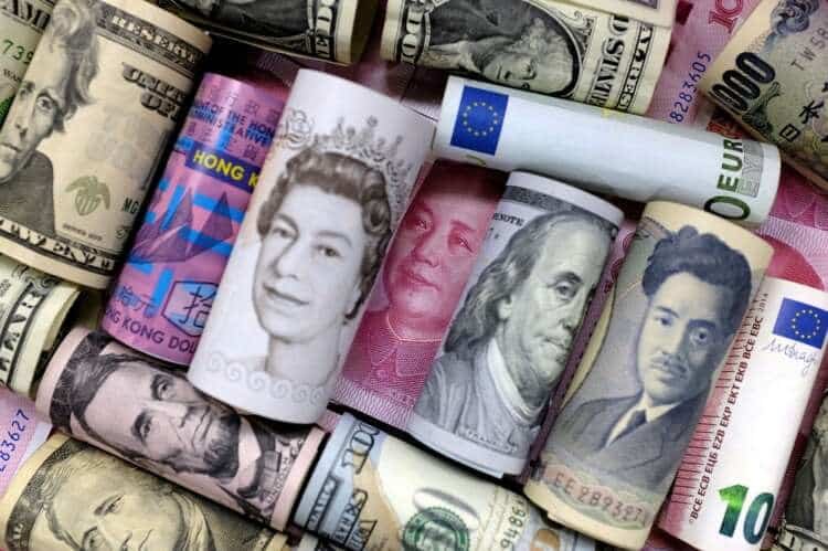 Various global currencies including U.S. dollar and Chinese yuan illustrating currency fluctuations - Global Banking & Finance Review