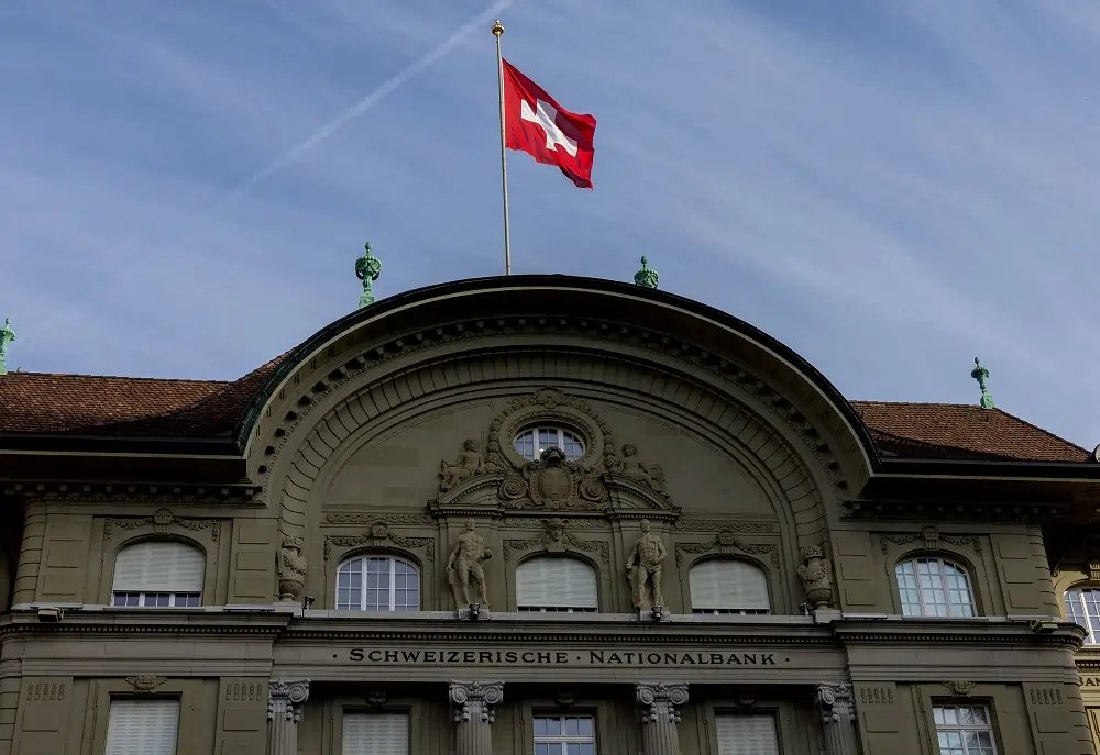 Swiss National Bank logo and financial graphs illustrating record profits - Global Banking & Finance Review