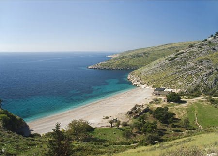 Foreign visitors enjoying Albania's beautiful landscape, reflecting growth in tourism - Global Banking & Finance Review