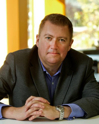 Mike Hughes discussing social media's role in customer service for financial services - Global Banking & Finance Review