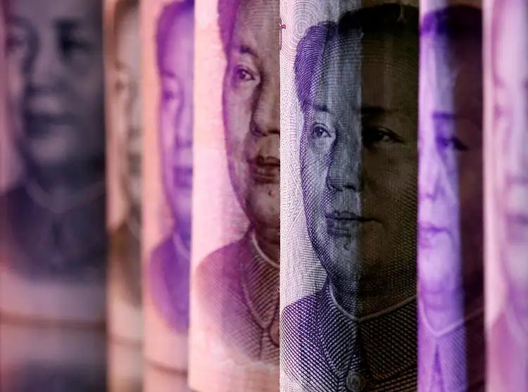 Image for China’s yuan slides to four-month low on Trump’s tariff promise