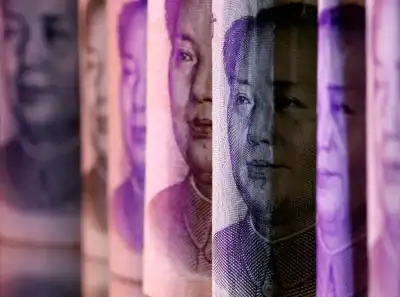 Image for China’s yuan slides to four-month low on Trump’s tariff promise