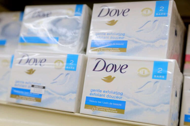 Dove products on display in a retail store amidst Unilever's sales challenges - Global Banking & Finance Review