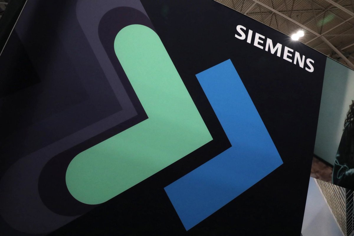 Siemens logo on a factory setting illustrating industrial business struggles - Global Banking & Finance Review