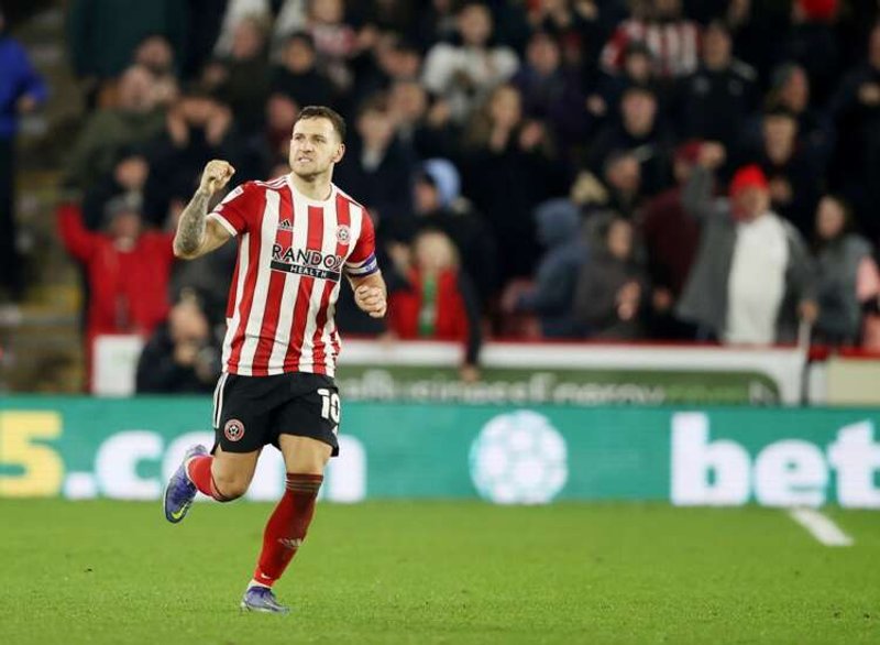 Image for Soccer-Police arrest man after Blades skipper Sharp attacked