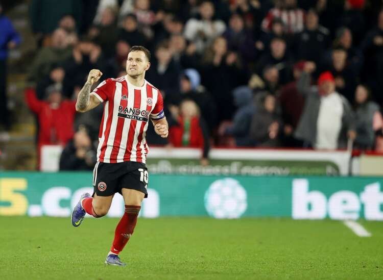 Image for Soccer-Police arrest man after Blades skipper Sharp attacked