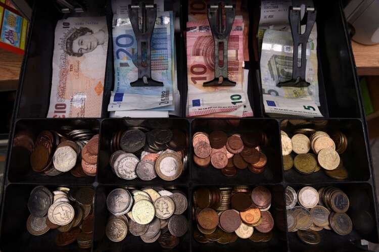 Cash register displaying Euro and Sterling currencies, highlighting forex trends - Global Banking & Finance Review