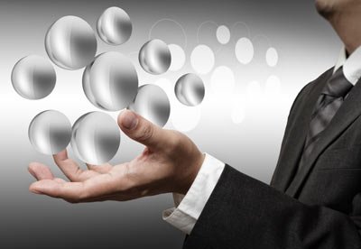 Hand holding a digital atom symbolizing innovation in banking technology - Global Banking & Finance Review