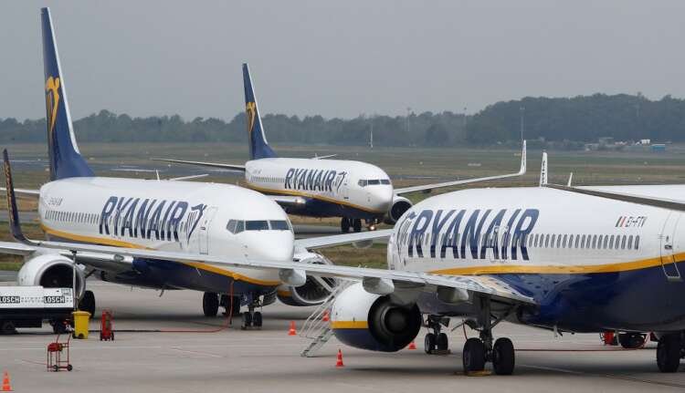 Ryanair airplane taxiing at Weeze Airport, symbolizing post-COVID recovery - Global Banking & Finance Review