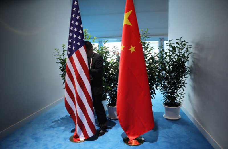 Image for Analysis: Delay to U.S. China investment ban leaves U.S. investors in limbo