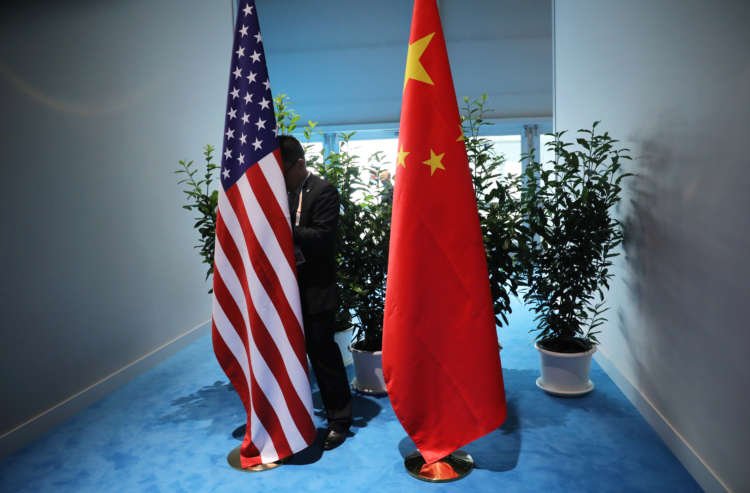 Image for Analysis: Delay to U.S. China investment ban leaves U.S. investors in limbo