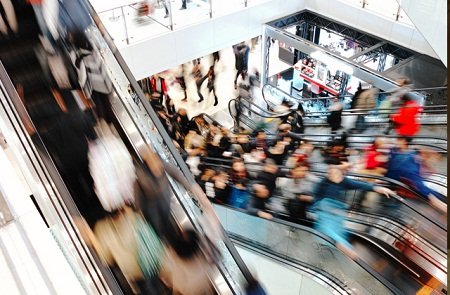 Business professionals discussing data analytics for customer insights - Global Banking & Finance Review