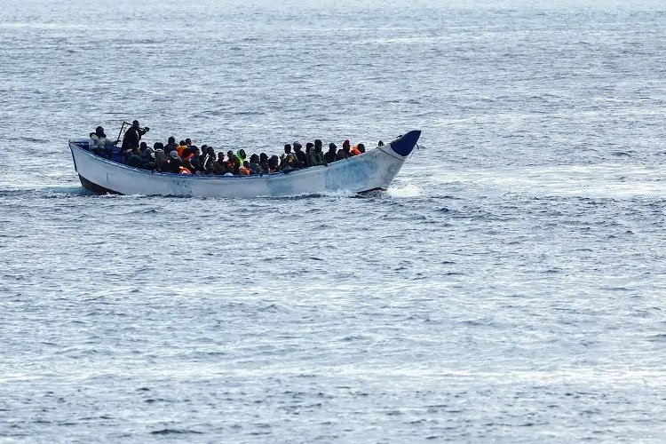 Migrants on a small boat arriving in Spain's Canary Islands amid record numbers - Global Banking & Finance Review