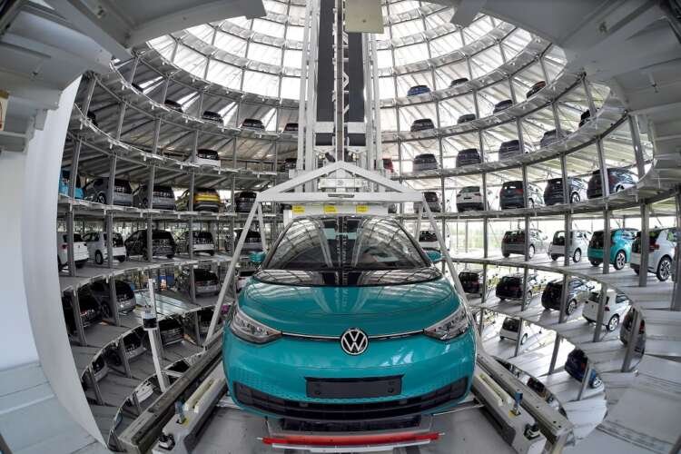 Volkswagen production line showcasing ID.3 vehicles amidst supply chain challenges - Global Banking & Finance Review