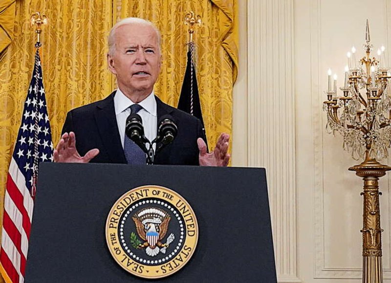 Image for Biden order bans investment in dozens of Chinese defense, tech firms