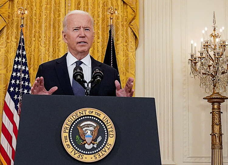 Image for Biden order bans investment in dozens of Chinese defense, tech firms