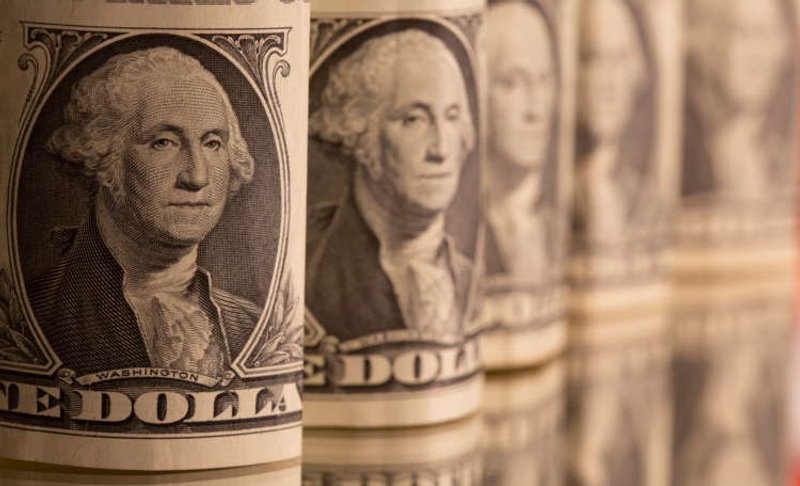 Image for Dollar defensive as Treasury yields slip from near 14-month highs