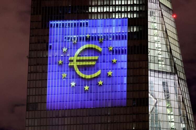 European Central Bank headquarters illuminated, reflects ECB interest rate hike debate - Global Banking & Finance Review