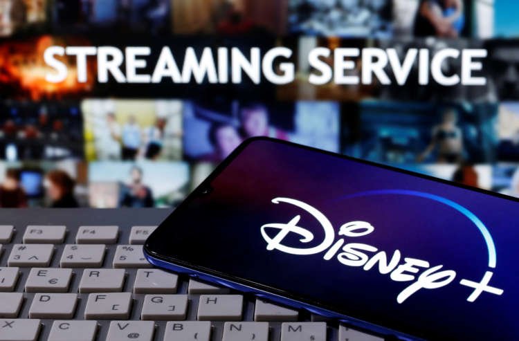 Image for Disney crosses streaming milestone, aims to open California parks in late April