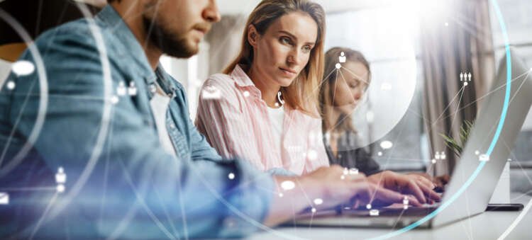 Group of young business professionals collaborating on IT security strategies - Global Banking & Finance Review