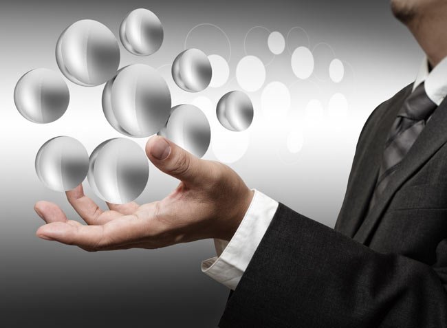 A hand holding a smartphone displaying sales data analytics - Global Banking & Finance Review