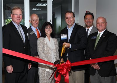 Group photo of tech leaders at Peak 10 data center opening in Atlanta - Global Banking & Finance Review