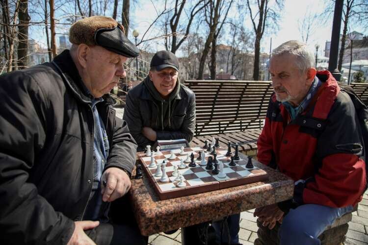 Two men playing chess in a Kyiv park as the city recovers post-Russian withdrawal - Global Banking & Finance Review