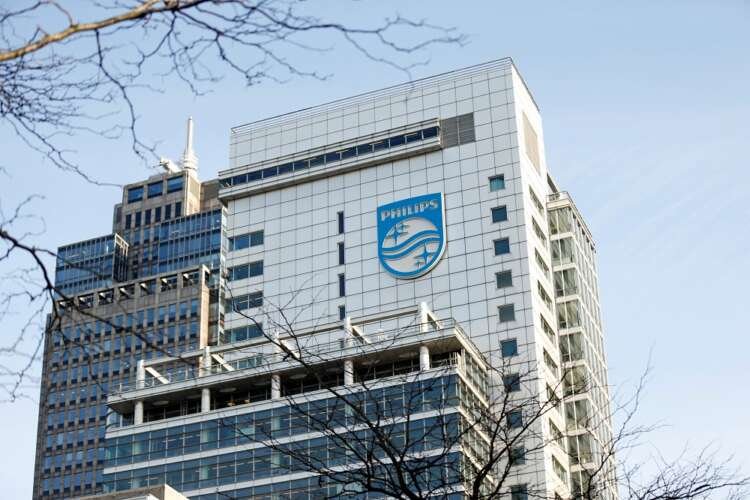 Philips logo at company headquarters in Amsterdam, representing recent financial struggles - Global Banking & Finance Review