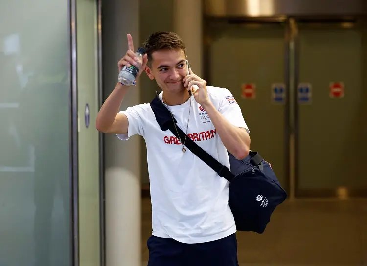 Alex Yee celebrates his victory, winning the triathlon world title after Olympic gold - Global Banking & Finance Review