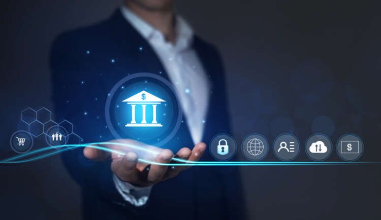 Bank safety and protection of personal and financial data. Businessman holding online banking icons and network connection icons. Digital technology business.