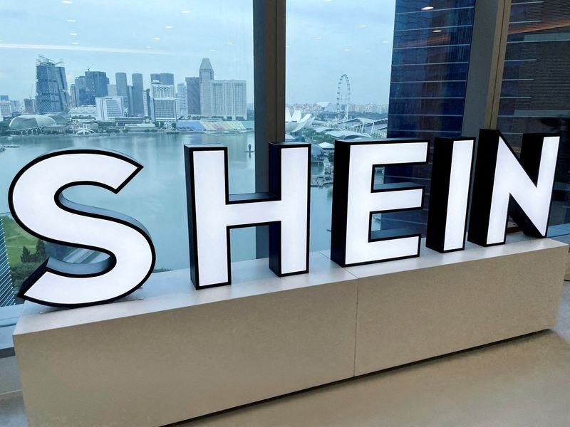 Shein's logo with financial graphs illustrating valuation pressure - Global Banking & Finance Review