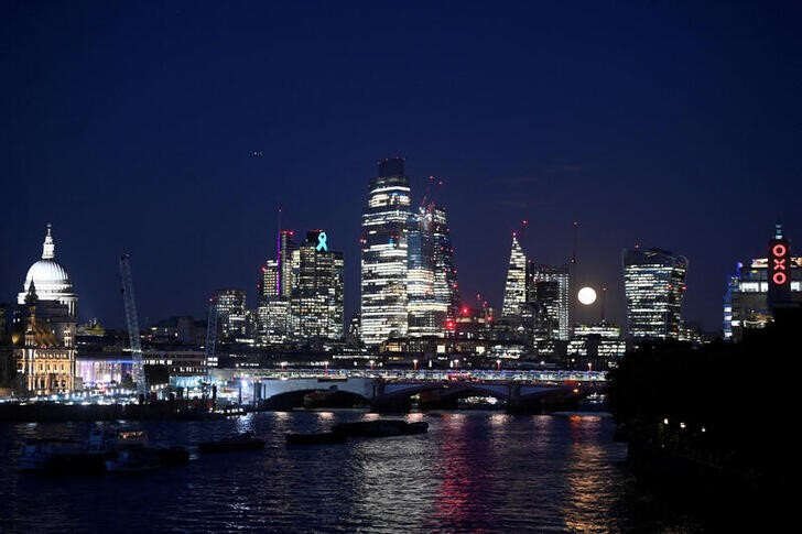 Moon rise over the City of London, symbolizing the financial sector's resilience - Global Banking & Finance Review