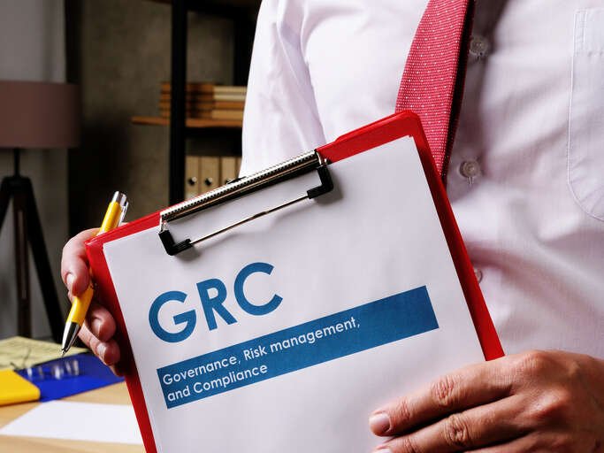 A business team collaborating on GRC strategies to manage risks effectively - Global Banking & Finance Review