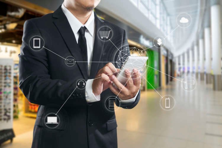 Man using mobile payments for online shopping, highlighting digital finance trends - Global Banking & Finance Review