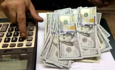 Image for Dollar hovers near one-month low, set for worst week since May