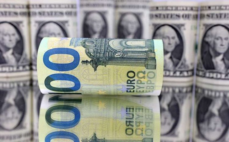 Image for Dollar trims gains vs euro after U.S. inflation data