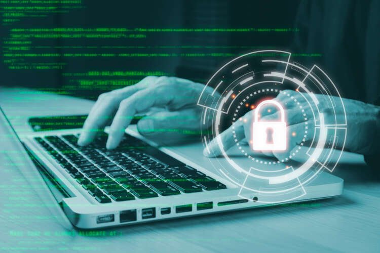 Cybersecurity professional analyzing phishing threats in a hybrid work environment - Global Banking & Finance Review