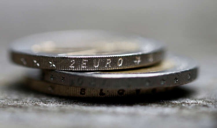 A close-up of Euro coins symbolizing Eurozone finance discussions - Global Banking & Finance Review