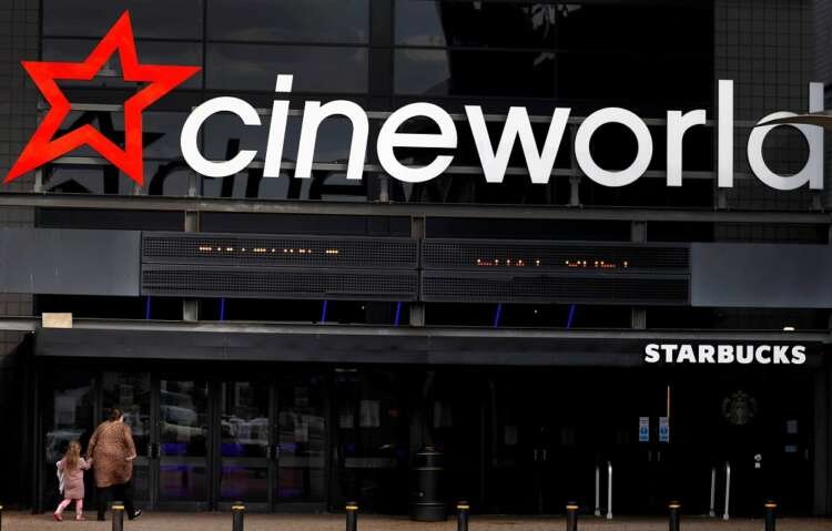 Cineworld cinema entrance with movie-goers amid financial challenges - Global Banking & Finance Review